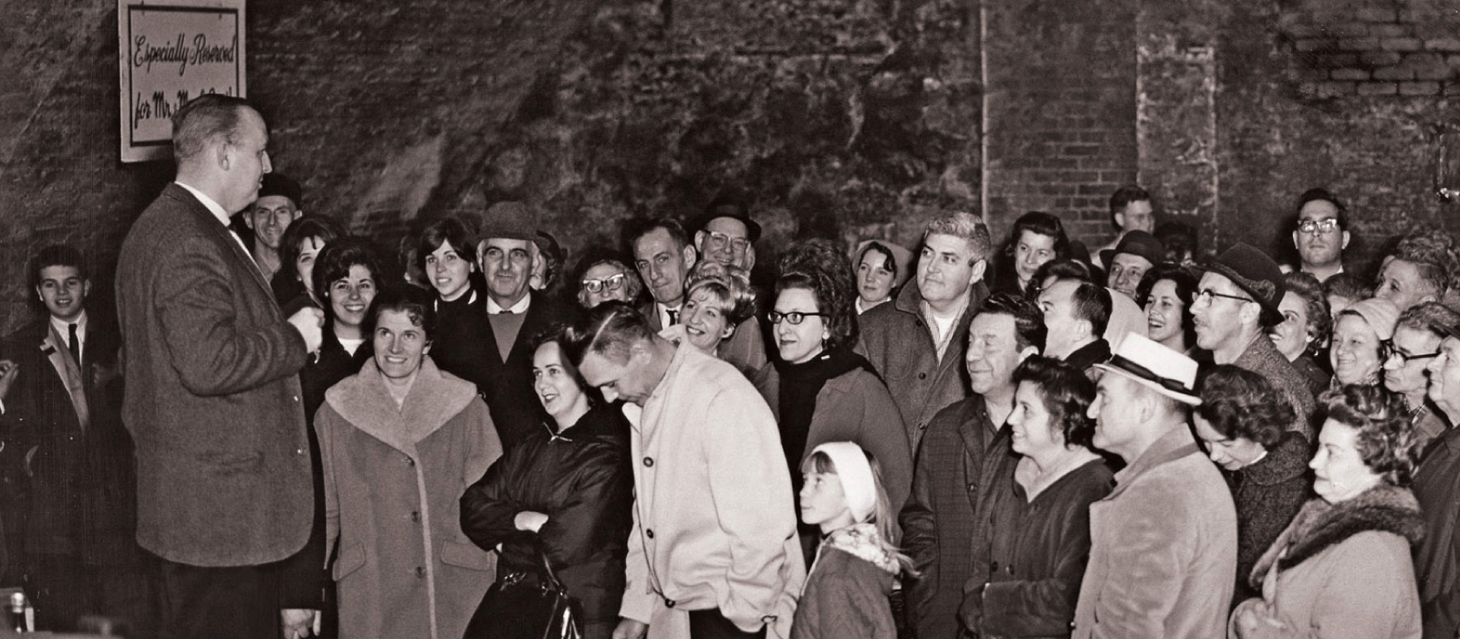 Tour guide entertains visitors.
