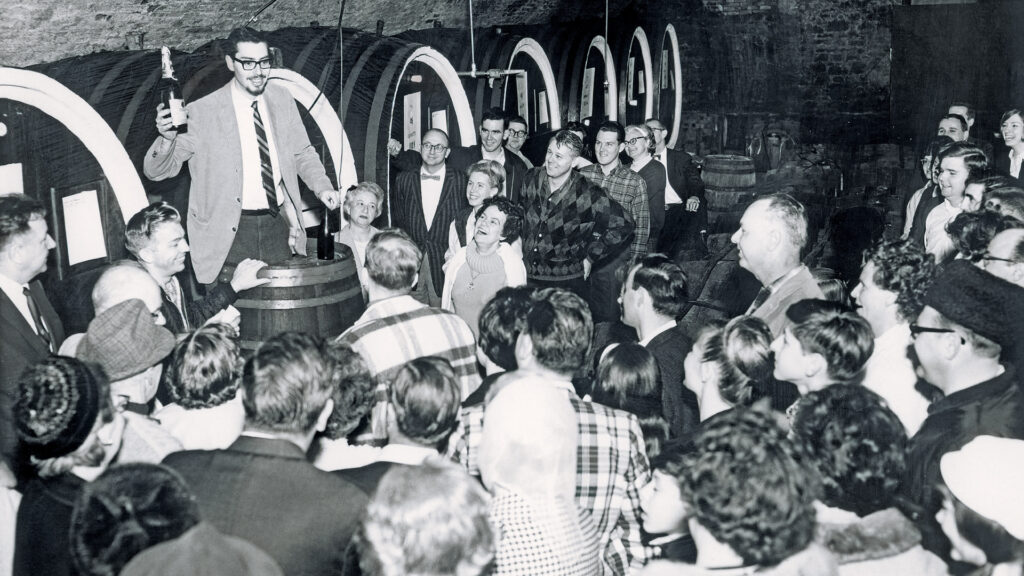Tour guide Michael Itskowitz explaining champagne fermentation at Brotherhood Winery aging vaults