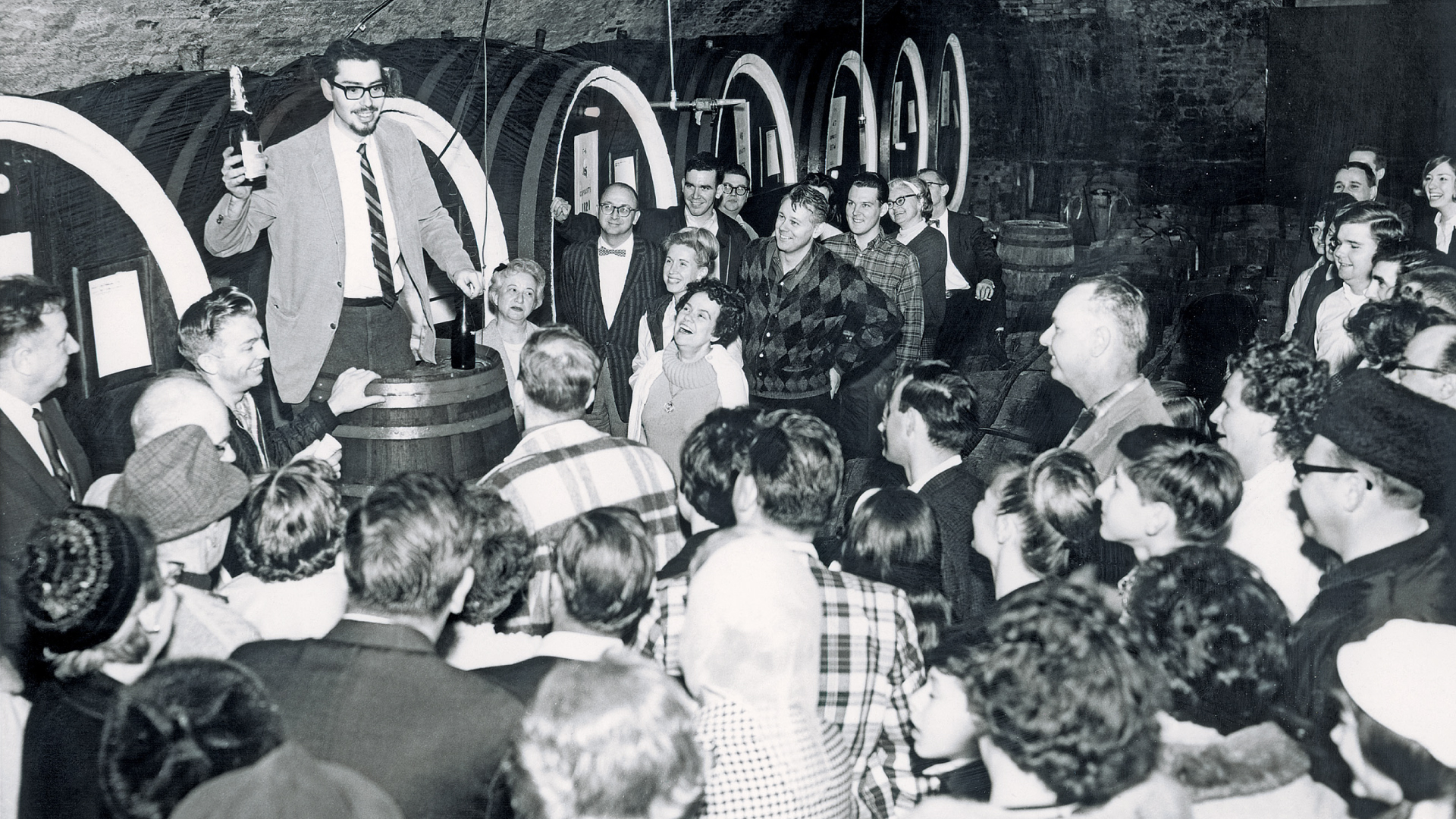 Tour guide Michael Itskowitz explaining champagne fermentation at Brotherhood Winery aging vaults